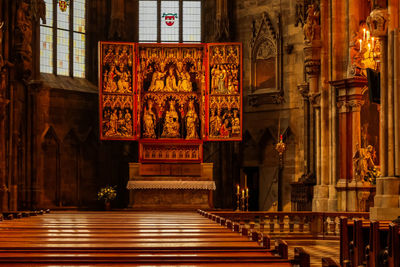 Interior of illuminated church building at night in vienna 