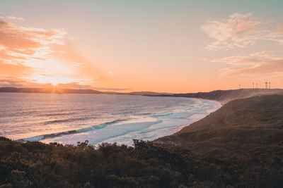 Scenic view of sea against sky during sunset