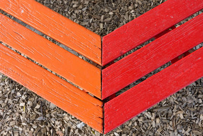 High angle view of red books on wood