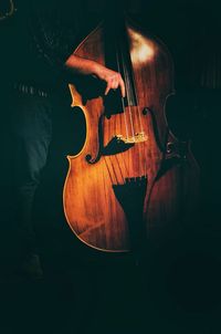 Close-up of guitar at night