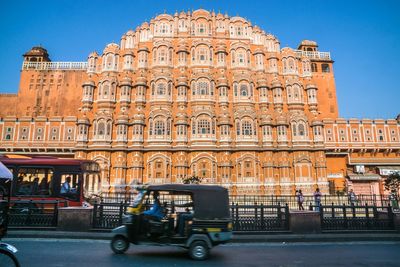 Low angle view of hawa mahal against clear blue sky