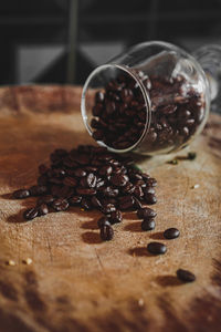 Close-up of coffee beans on table