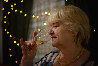 Close-up of woman drinking alcohol