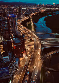 High angle view of illuminated city at night