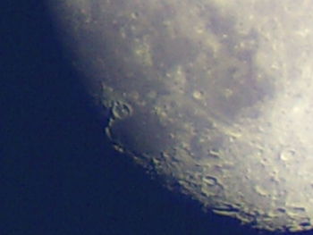 Close-up of water splashing against sky