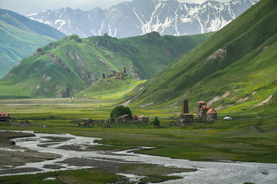 Scenic view of truso valley in caucasian mountains against sky