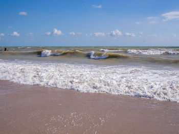 Scenic view of beach against sky