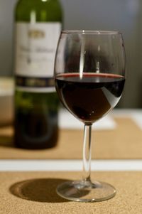 Close-up of wineglass on table