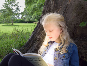 Girl sitting in park