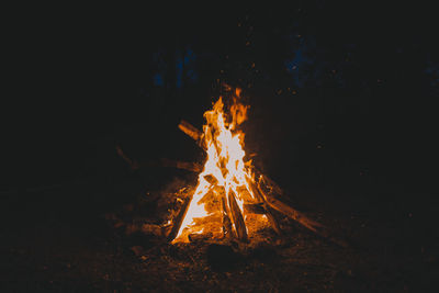 Bonfire on field at night