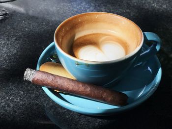 High angle view of coffee cup on table