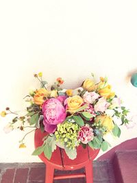 Close-up of multi colored flowers in vase