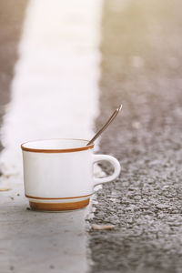 Close-up of coffee cup on table