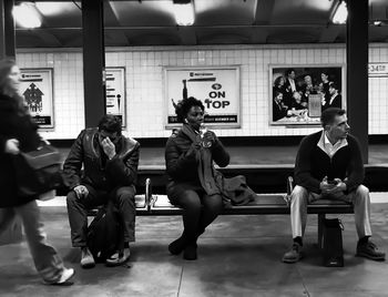 Group of people at railroad station