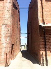 View of brick wall against sky