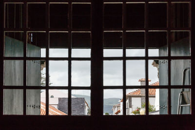 Close-up of glass window in building