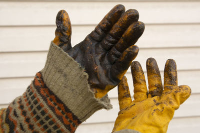 Close-up of human hand holding metal