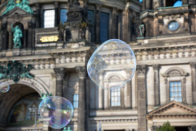 Low angle view of bubbles in building