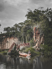 Man fishing in lake