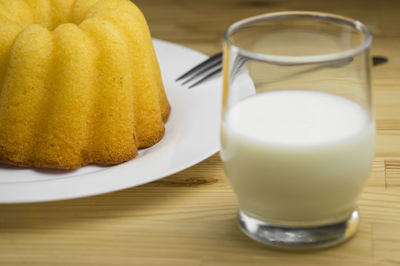 Close-up of milk and dessert on table