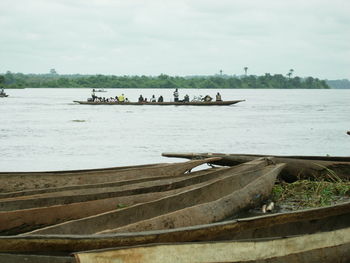 People in boat on sea