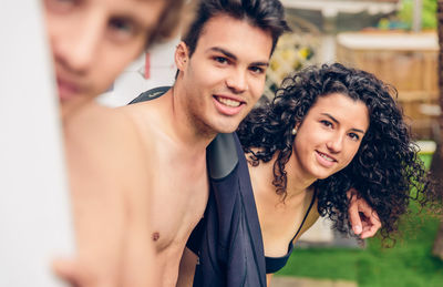 Portrait of smiling young friends