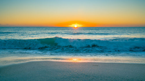 Scenic view of sea against sky during sunset