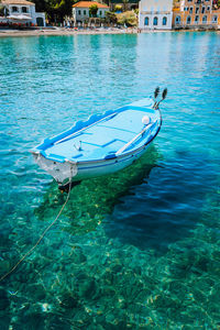 Boat moored in sea