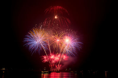 Firework display at night