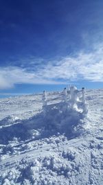 Scenic view of sea against sky during winter