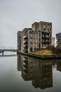Residential houses at havneøen, vejle harbour in misty weather