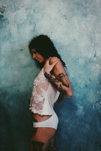 Close-up of woman standing in pond