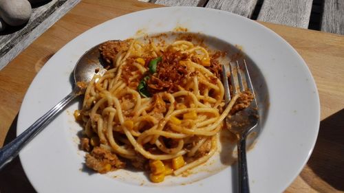 Close-up of noodles served in plate on table