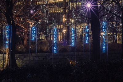 Illuminated text at night