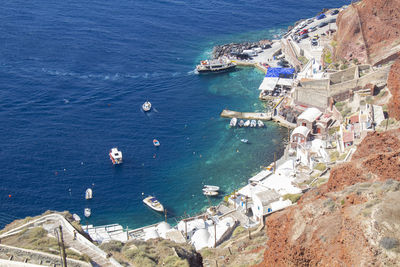 High angle view of townscape by sea