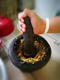 Close-up of person preparing food