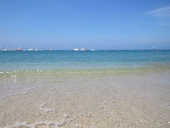 Scenic view of sea against clear sky