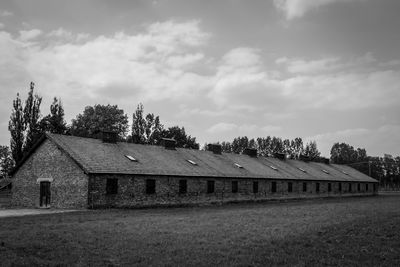 House on field against sky