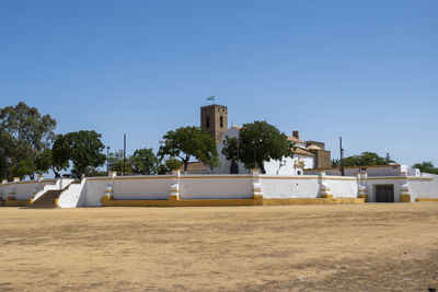 View of building against clear blue sky