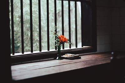 Flower vase on window sill