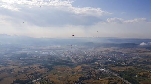 Aerial view of city against sky