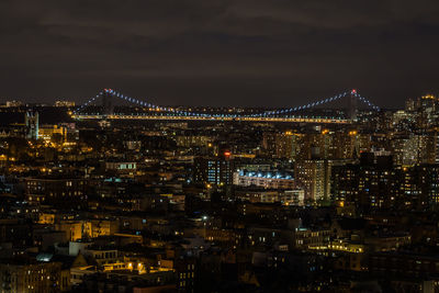 Illuminated cityscape at night