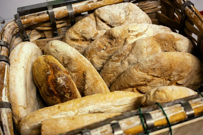 Basket of baked bread with wood oven.