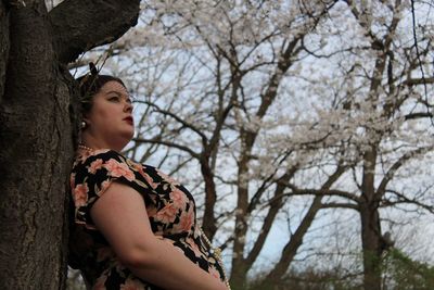 Side view of a young woman looking away