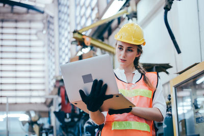 Woman working with mobile phone