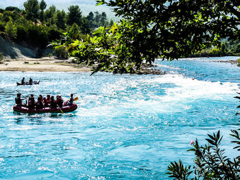 People on boat in sea