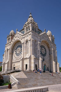 Facade of cathedral against clear blue sky