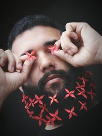 Close-up of man hands against black background