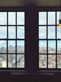 Close-up of trees seen through window