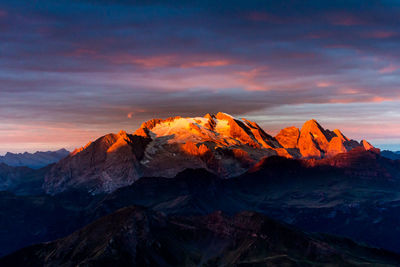 Scenic view of mountains against sky during sunset